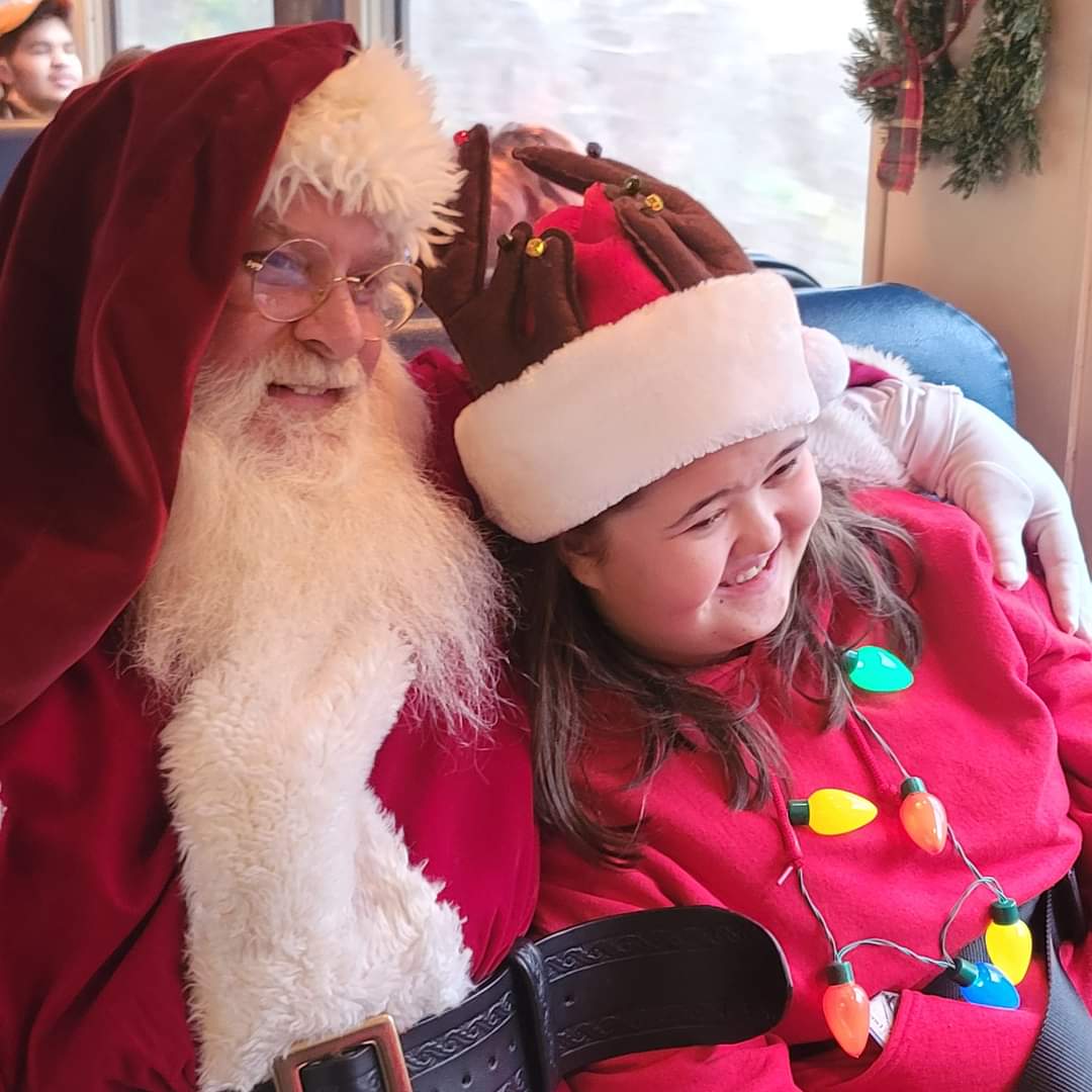 Santa on train with guest